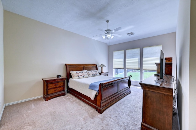 14022 Ashland Landing Dr, Cypress, TX 77429 - bedroom with carpet floors, baseboards, and a ceiling fan