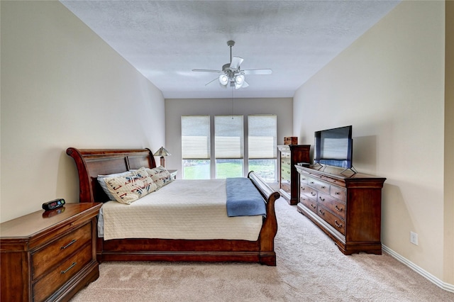 14022 Ashland Landing Dr, Cypress, TX 77429 - carpeted bedroom featuring baseboards and a ceiling fan