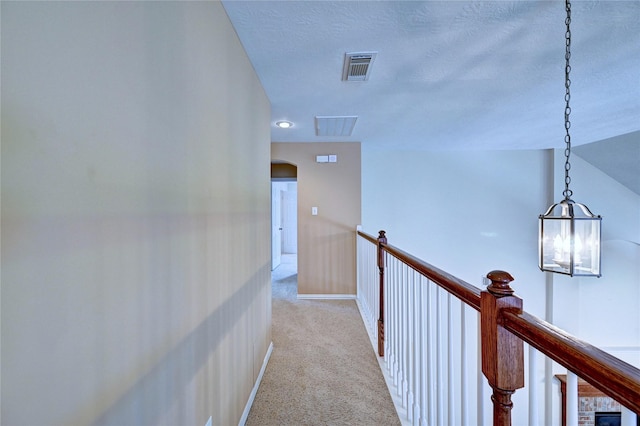 14022 Ashland Landing Dr, Cypress, TX 77429 - corridor featuring carpet flooring, arched walkways, and baseboards
