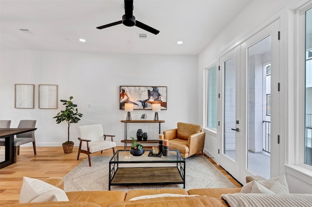 9428 Campbell Rd Unit B, Houston, TX 77080 - living room featuring light wood-style floors, recessed lighting, ceiling fan, and baseboards