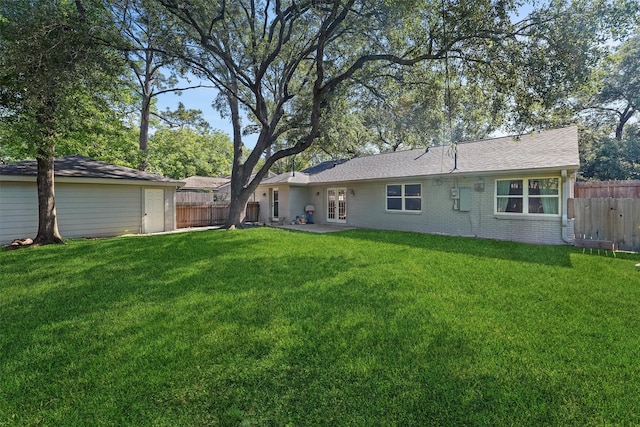 rear view of property featuring brick siding