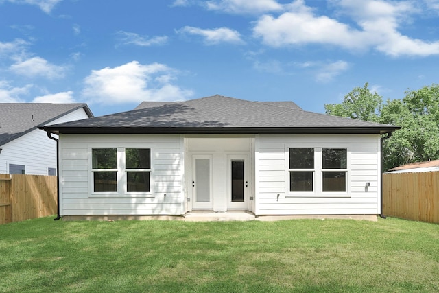 206 S 4th St, Conroe, TX 77301 - rear view of house with roof with shingles