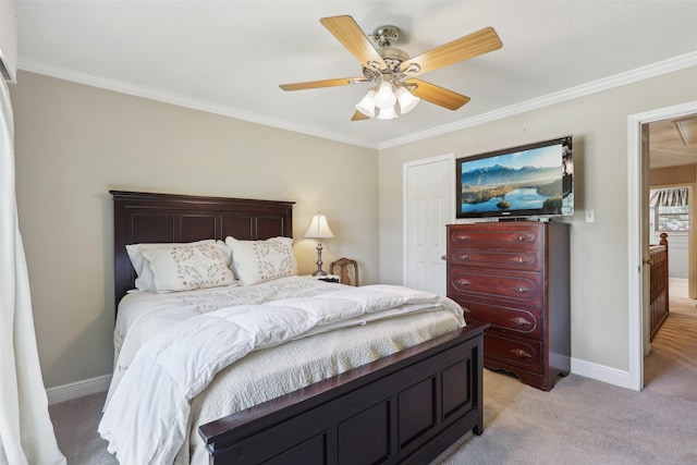 bedroom with light carpet, crown molding, baseboards, and ceiling fan