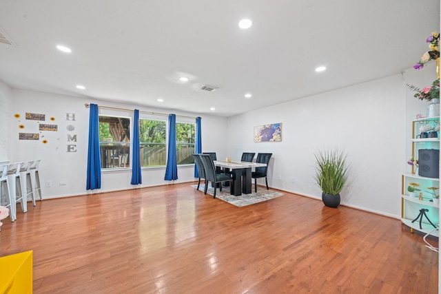 16815 Watering Oaks Ln, Houston, TX 77083 - dining room featuring wood finished floors, recessed lighting, and baseboards