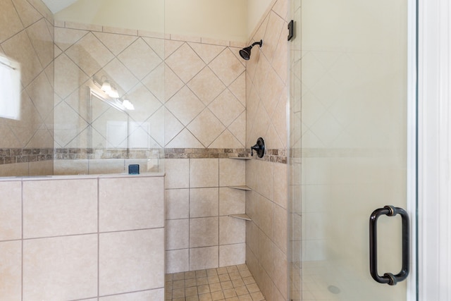 bathroom featuring a stall shower
