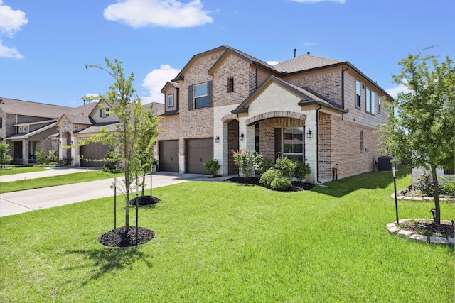 french country style house with concrete driveway, brick siding, a front lawn, and an attached garage