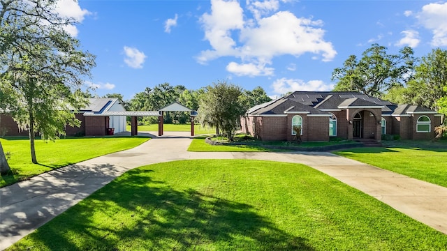 103 Deer Trl, Lake Jackson, TX 77566 - view of home's community featuring driveway and a yard