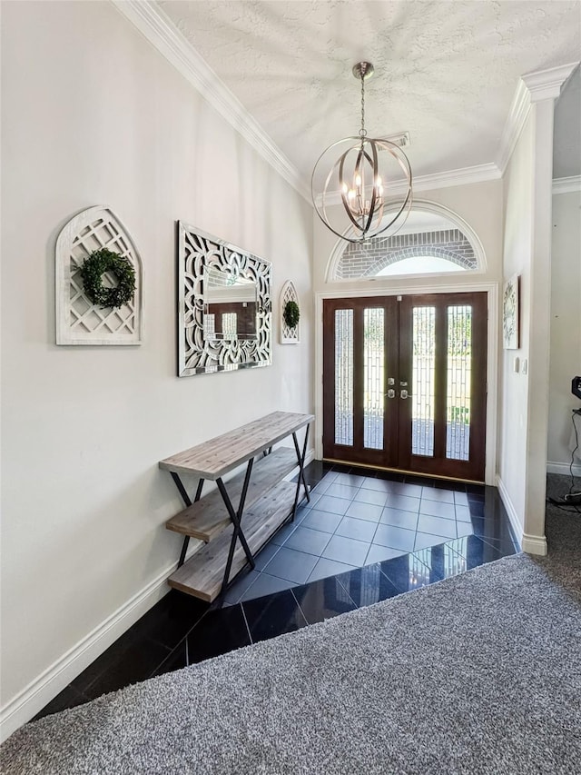 103 Deer Trl, Lake Jackson, TX 77566 - foyer with a chandelier, ornamental molding, baseboards, french doors, and granite floors