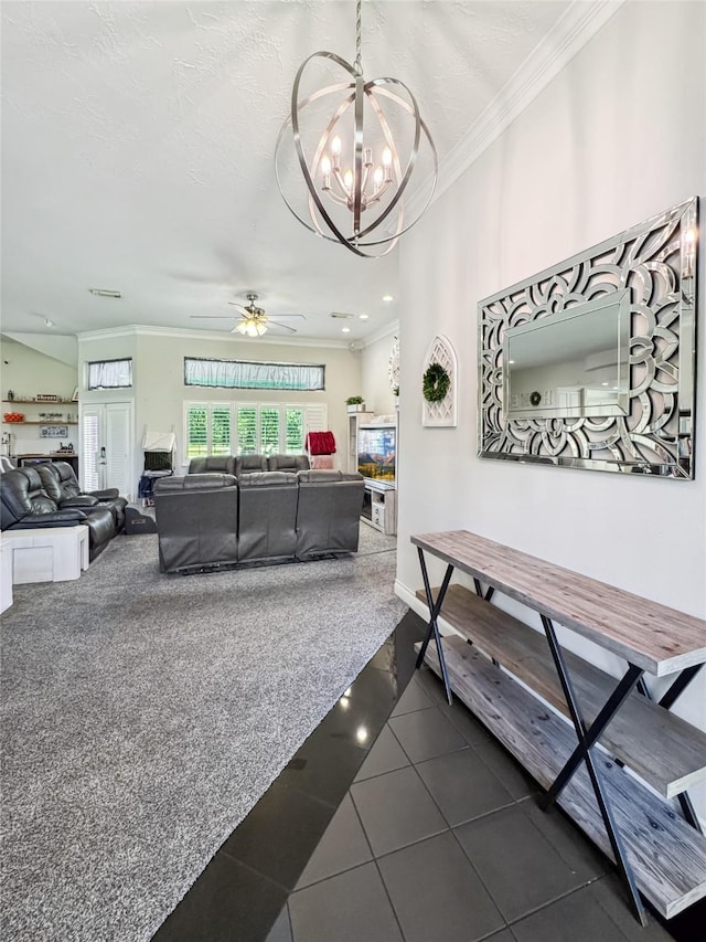 103 Deer Trl, Lake Jackson, TX 77566 - living room with crown molding, a chandelier, ceiling fan, dark tile patterned floors, and baseboards