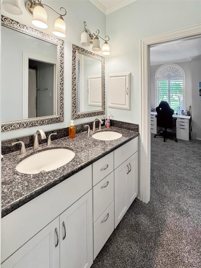 103 Deer Trl, Lake Jackson, TX 77566 - ensuite bathroom with crown molding and double vanity