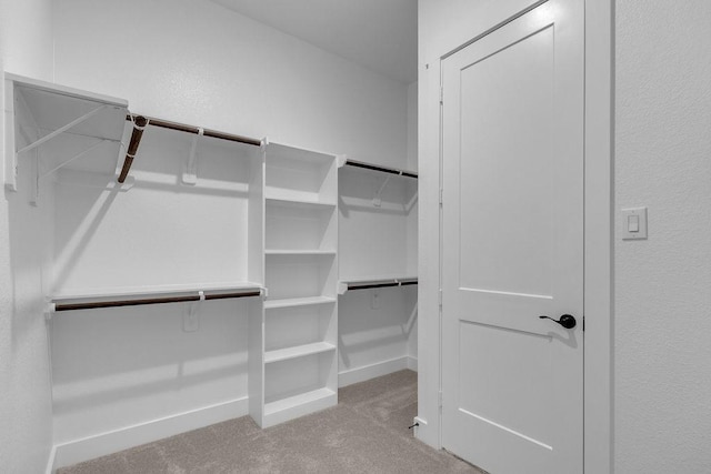 21705 Southern Valley Ln, New Caney, TX 77357 - spacious closet featuring carpet floors