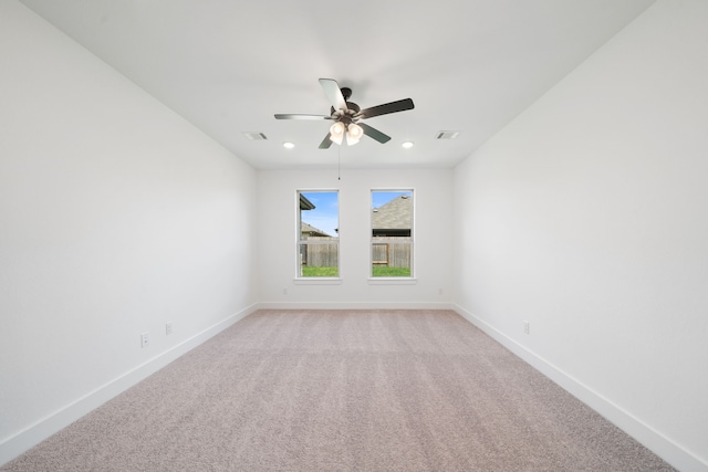 21705 Southern Valley Ln, New Caney, TX 77357 - spare room featuring light carpet, a ceiling fan, and recessed lighting