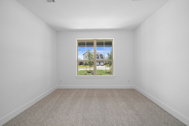 21705 Southern Valley Ln, New Caney, TX 77357 - carpeted empty room featuring baseboards