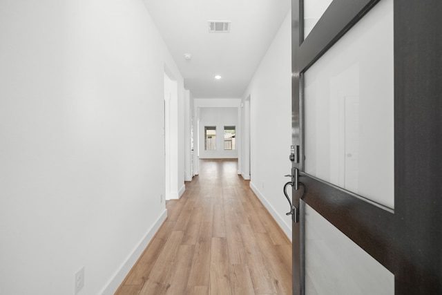 21705 Southern Valley Ln, New Caney, TX 77357 - corridor featuring light wood finished floors and recessed lighting