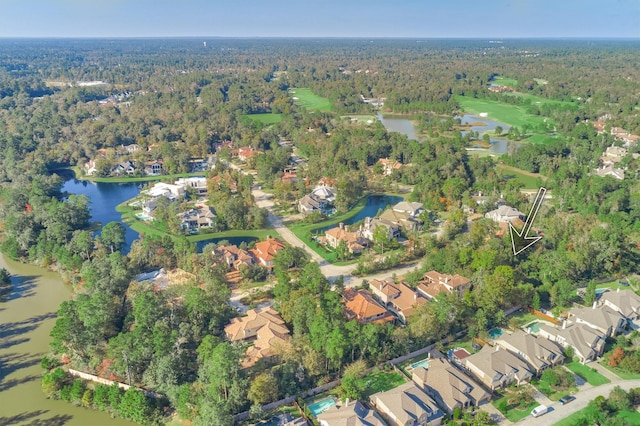 30 Johnathan Landing Ct, Spring, TX 77389 - aerial view of property's location featuring a heavily wooded area, a nearby body of water, and nearby suburban area