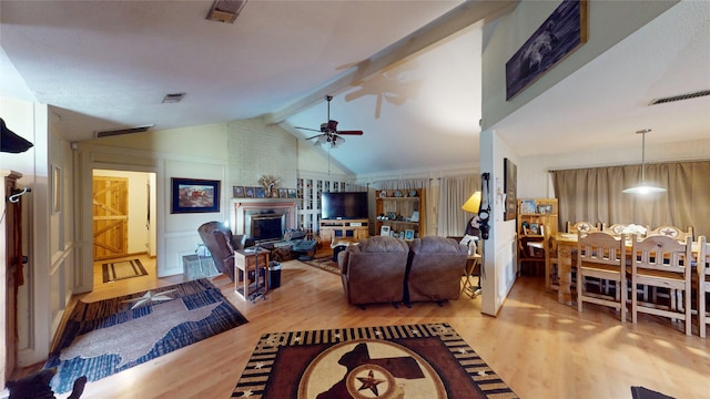 19115 Shay Ln, Humble, TX 77346 - living room with wood finished floors, a fireplace, and ceiling fan