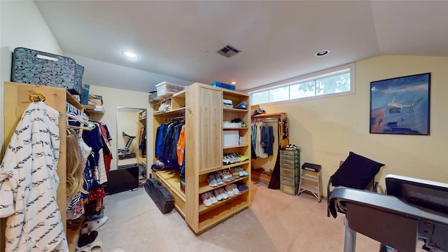19115 Shay Ln, Humble, TX 77346 - carpeted bedroom featuring a walk in closet, lofted ceiling, and recessed lighting