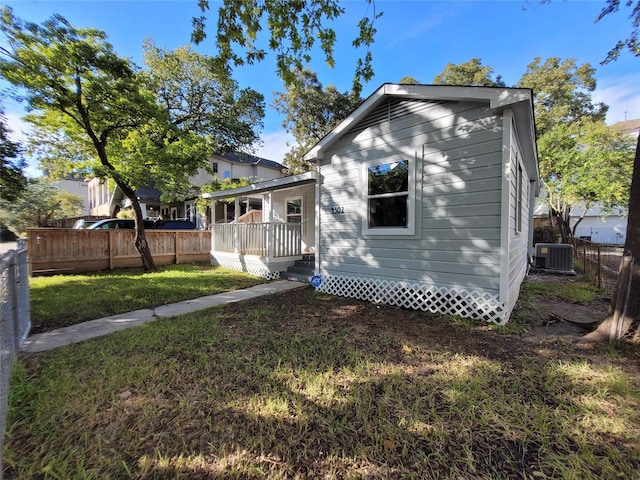 4302 Dickson St, Houston, TX 77007 - rear view of house with a porch and central AC unit