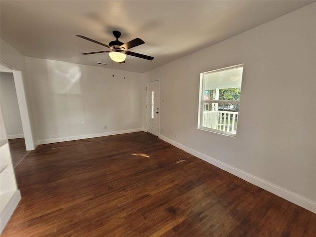 4302 Dickson St, Houston, TX 77007 - unfurnished room featuring dark wood-style floors, ceiling fan, and baseboards