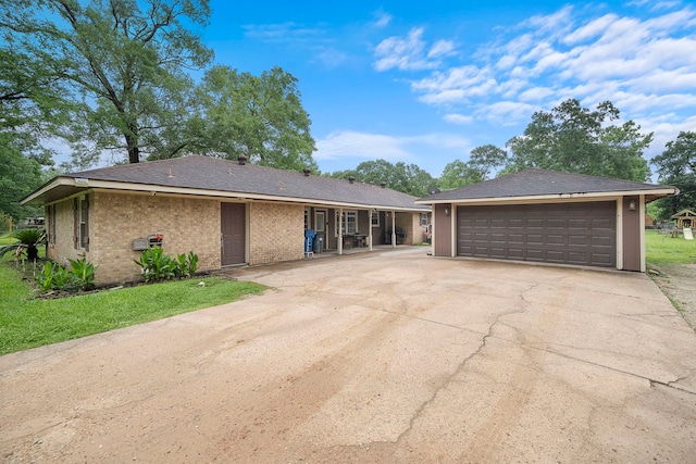 23114 Laura, New Caney, TX 77357 - ranch-style home with a detached garage and brick siding
