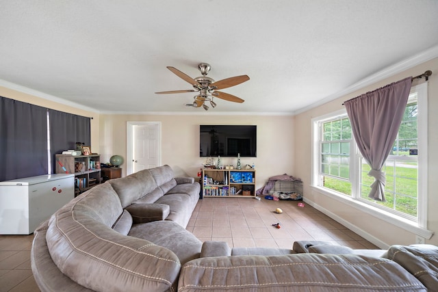 23114 Laura, New Caney, TX 77357 - tiled living area featuring a ceiling fan, ornamental molding, and baseboards