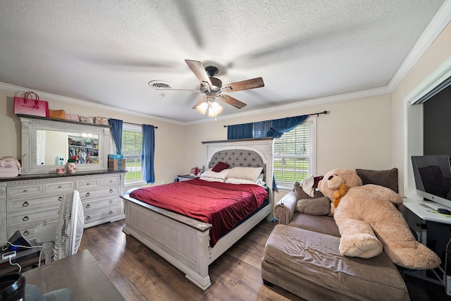 23114 Laura, New Caney, TX 77357 - bedroom featuring multiple windows, a textured ceiling, dark wood-style floors, crown molding, and a ceiling fan