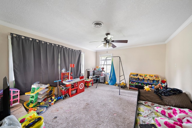 23114 Laura, New Caney, TX 77357 - playroom featuring crown molding, a textured ceiling, carpet, and ceiling fan