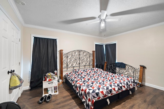 23114 Laura, New Caney, TX 77357 - bedroom featuring wood finished floors, ornamental molding, a textured ceiling, baseboards, and a ceiling fan