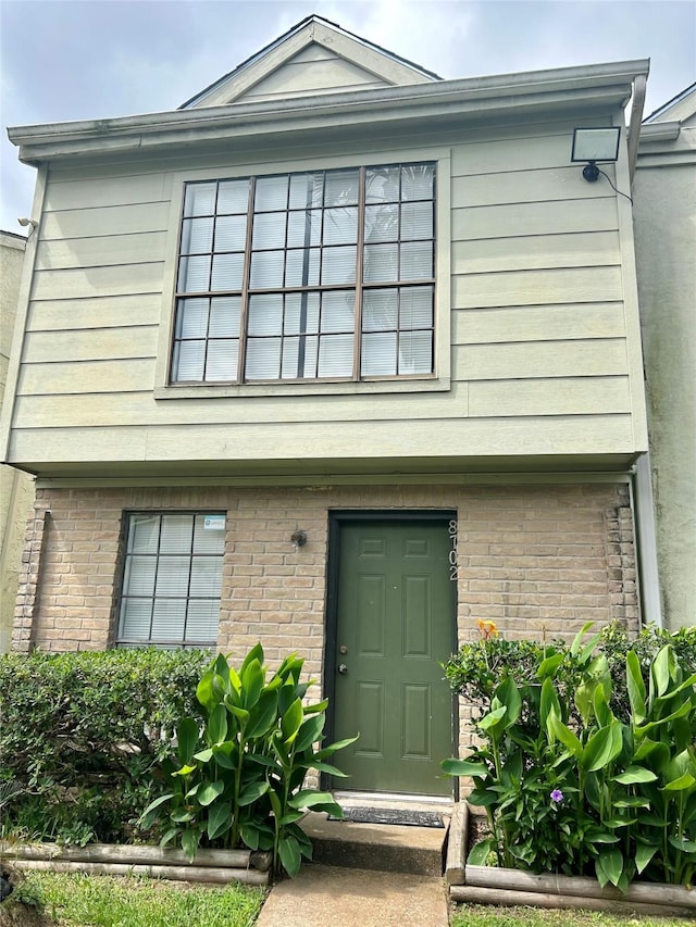 8702 Victorian Village Dr Unit 8702, Houston, TX 77071 - view of front of home featuring brick siding