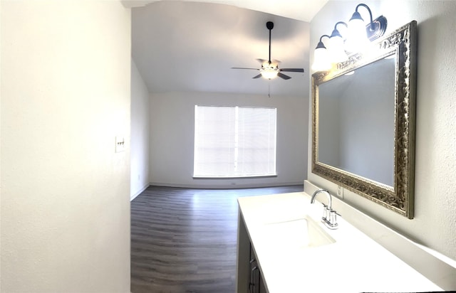 8702 Victorian Village Dr Unit 8702, Houston, TX 77071 - bathroom featuring a ceiling fan, wood finished floors, vanity, and vaulted ceiling