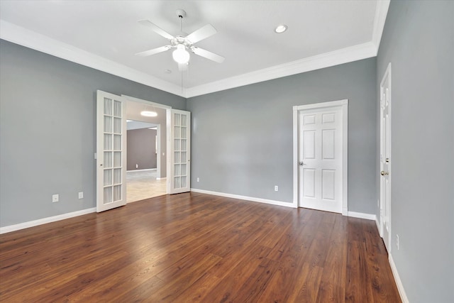 unfurnished room featuring ceiling fan, french doors, ornamental molding, wood finished floors, and baseboards