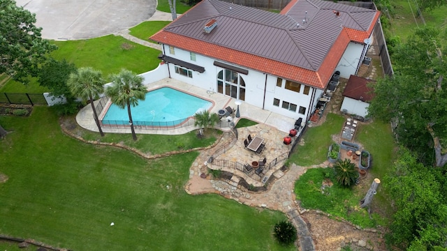 view from above of property featuring a pool area