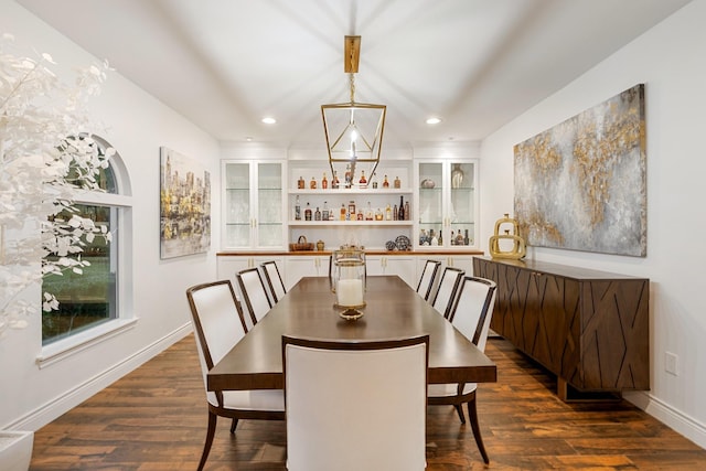 dining area featuring dark wood-style floors, recessed lighting, and baseboards
