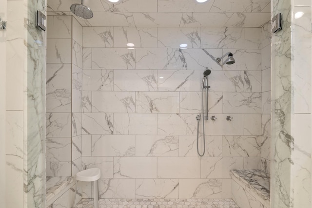 bathroom featuring tiled shower