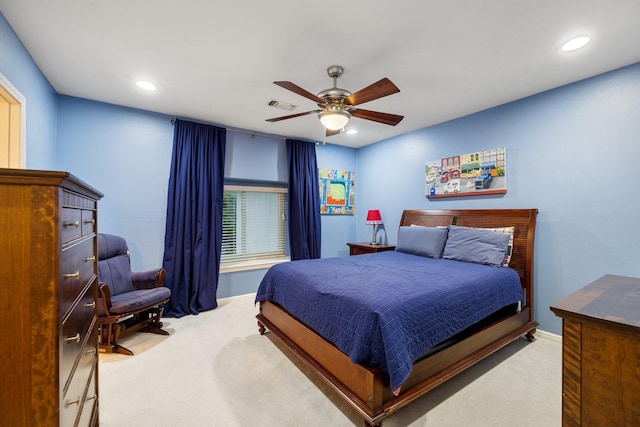 carpeted bedroom featuring ceiling fan and recessed lighting