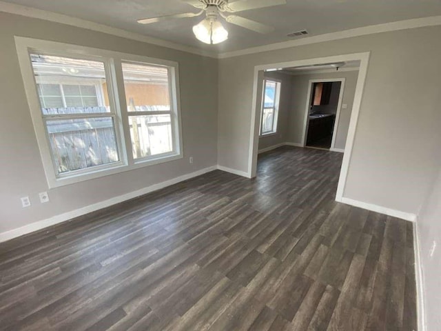 7015 Boyce St, Houston, TX 77020 - empty room with baseboards, healthy amount of natural light, crown molding, and a ceiling fan