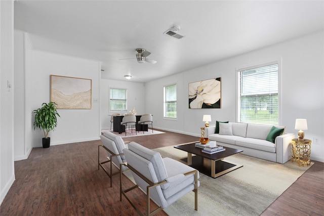 139 Holly Rdg, Onalaska, TX 77360 - living area with wood finished floors, a ceiling fan, and baseboards