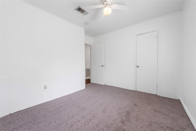 139 Holly Rdg, Onalaska, TX 77360 - unfurnished bedroom featuring carpet, ornamental molding, and a ceiling fan