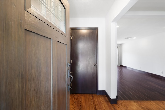 5418 Poinciana Dr, Houston, TX 77092 - entryway with dark wood-type flooring and baseboards