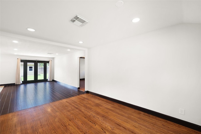5418 Poinciana Dr, Houston, TX 77092 - unfurnished room with dark wood-style floors, baseboards, and recessed lighting