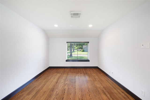 5418 Poinciana Dr, Houston, TX 77092 - spare room with wood finished floors, baseboards, and recessed lighting