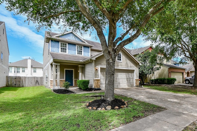 view of front of house featuring driveway and stone siding