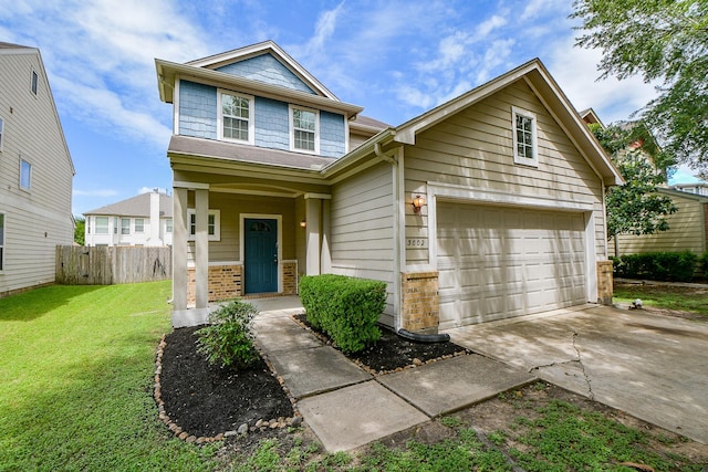 view of front of house with driveway, a porch, and brick siding
