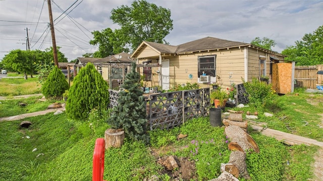 8935 Duane St, Houston, TX 77051 - view of front of property with fence and cooling unit