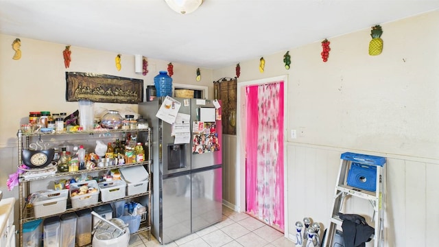 8935 Duane St, Houston, TX 77051 - kitchen with stainless steel refrigerator with ice dispenser, wainscoting, and tile patterned floors