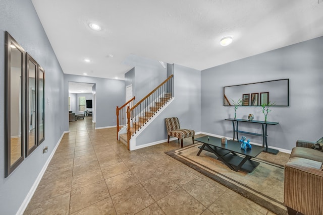 20703 Fawn Timber Trl, Humble, TX 77346 - living room featuring stairway, baseboards, and recessed lighting
