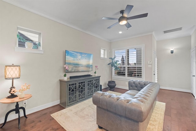 18135 Moonlit River Dr, Cypress, TX 77433 - living area with crown molding, wood finished floors, ceiling fan, baseboards, and recessed lighting