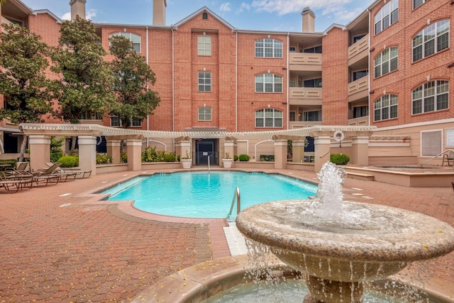 2111 Welch St Unit B201, Houston, TX 77019 - community pool featuring a pergola