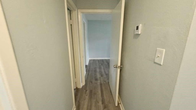 4215 Los Angeles St, Houston, TX 77026 - corridor featuring wood finished floors and baseboards