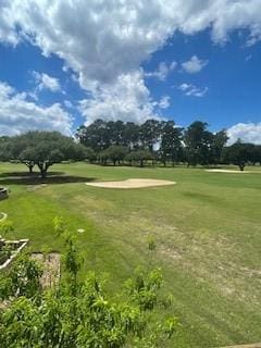 52 April Hl Unit 52, Conroe, TX 77356 - view of home's community with golf course view and a yard